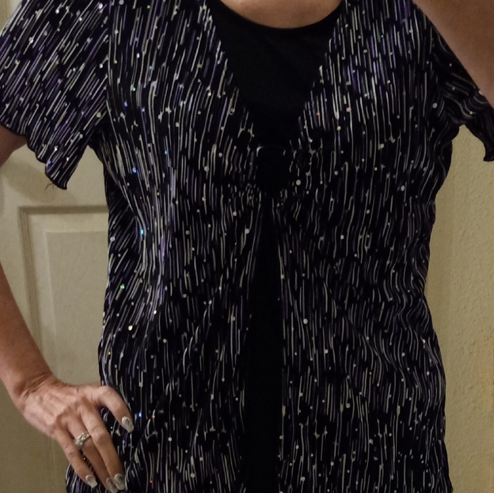 Ashley J Black w/ silver and purple. reflective embellishments. polyester 1x